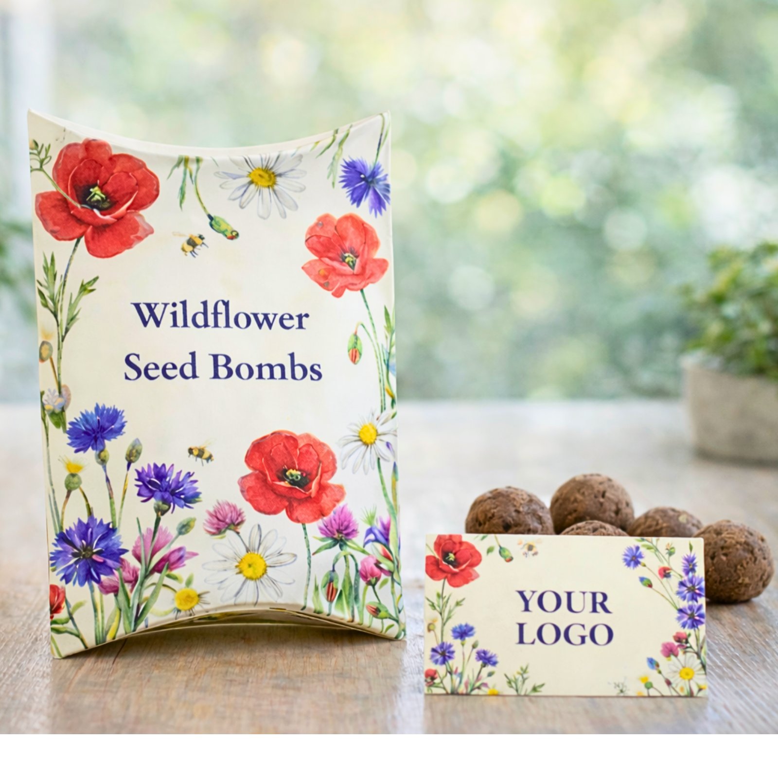 Sustainable branded gifts for UK business events featuring a wildflower seed bomb gift box and custom-logo card