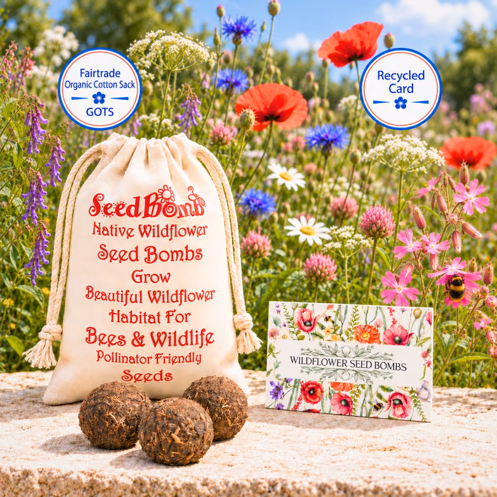 Cotton seed bomb sack with a floral card and three seed bombs displayed among wildflowers